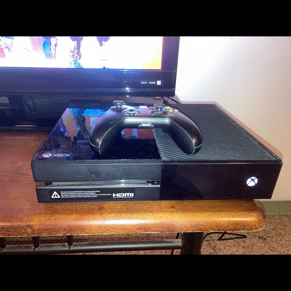 Xbox One - Controller, games, charging station, and HDMI cord included